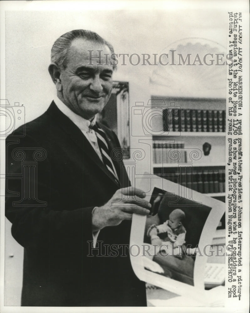 Load image into Gallery viewer, 1967 Press Photo President Johnson Shows Photo of His Grandson - ney27564

