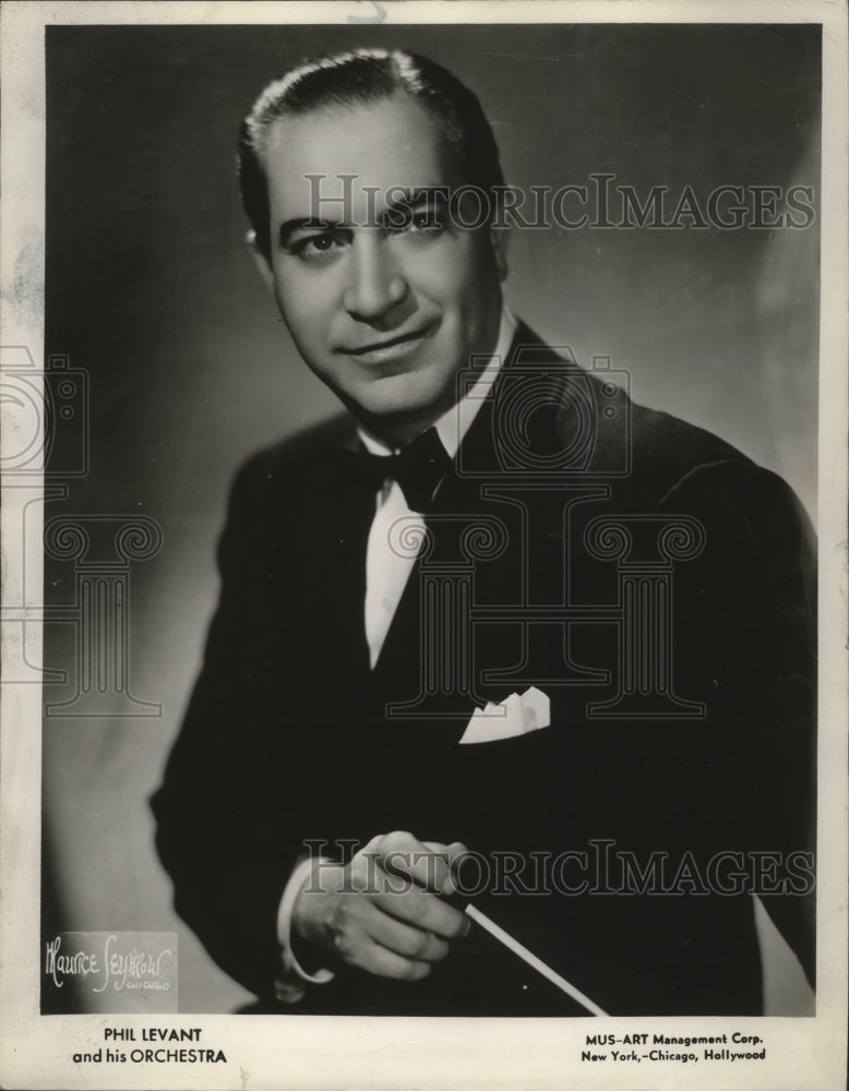 Load image into Gallery viewer, 1956 Press Photo Orchestra Conductor Phil Levant - ney29640
