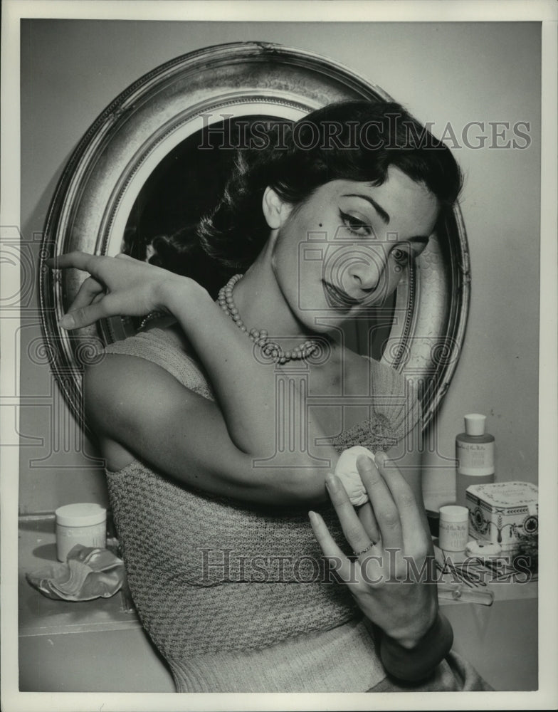 1951 Press Photo Unidentified Female Demonstrates Care of Elbows