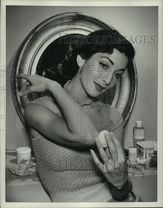 1951 Press Photo Unidentified Female Demonstrates Care of Elbows