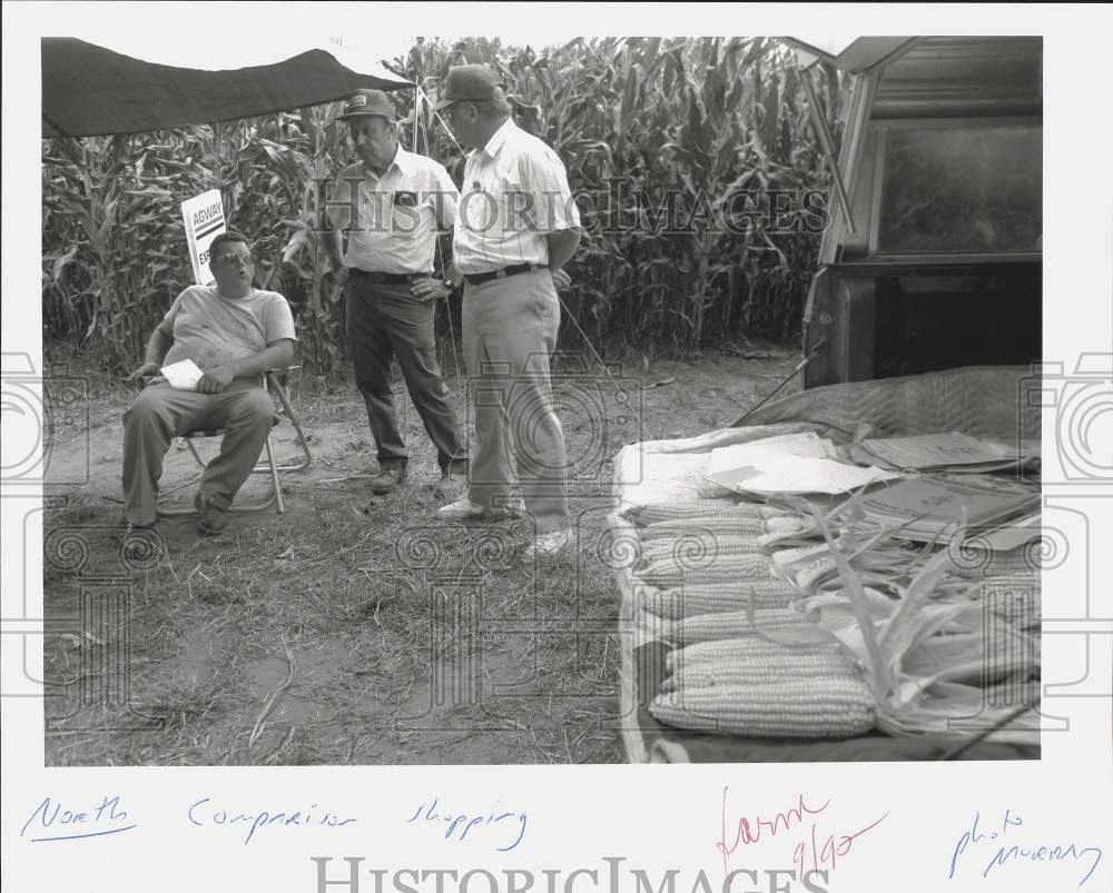 1992 Press Photo Trio of Men with Corn from different Farms - nht04718- Historic Images