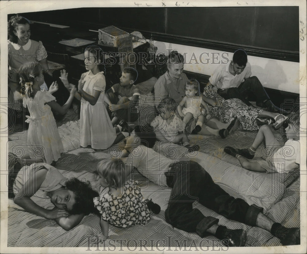 1950 Press Photo Selina Nunez with Grandchildren at Saint Bernard During Storms- Historic Images