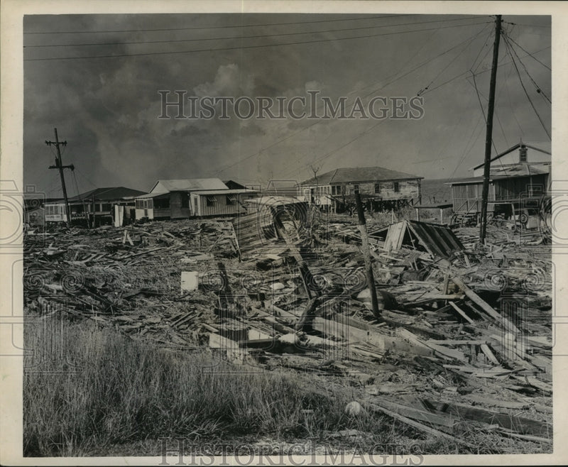 Load image into Gallery viewer, 1965 Press Photo Hurricane Betsy- Ruined fishing camps at Lake Catherine and 90.
