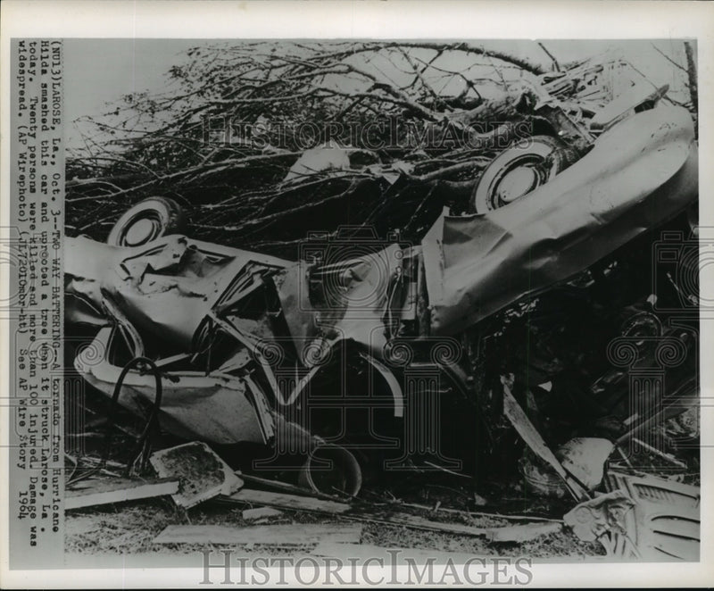 Load image into Gallery viewer, 1964 Press Photo Hurricane Hilda- Tornado from Hurricane Hilda smashed this car

