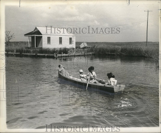 1964 Press Photo Children Ride Piroque to and From School - noa03549- Historic Images