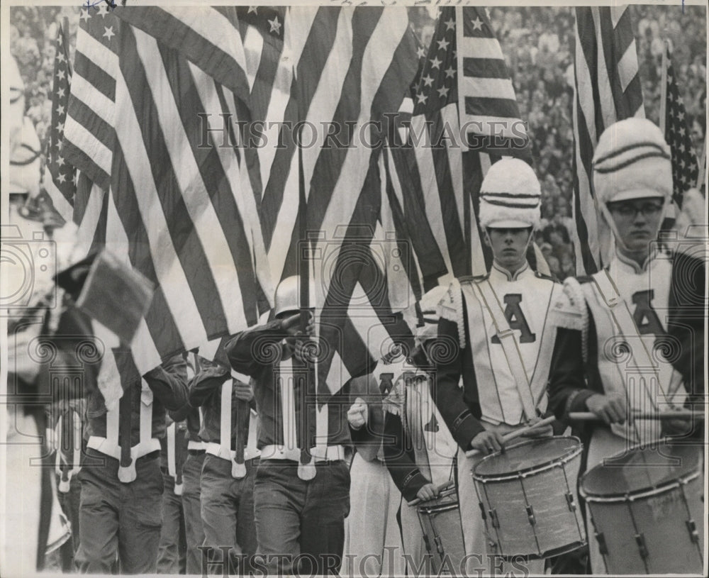 1967 Press Photo Sugar Bowl- Seabees carry colors through Alabama Band.