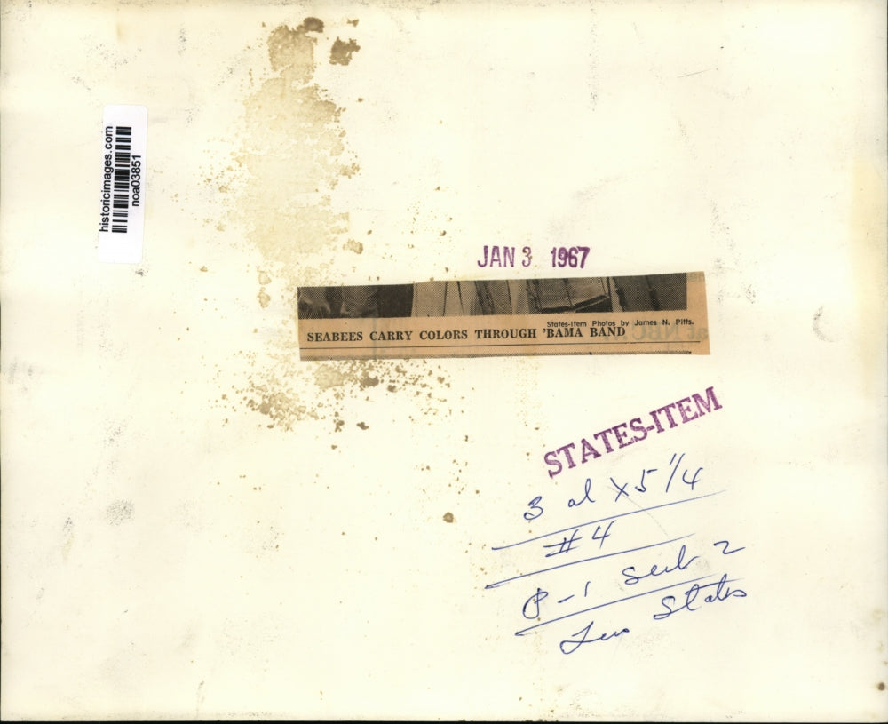 1967 Press Photo Sugar Bowl- Seabees carry colors through Alabama Band.