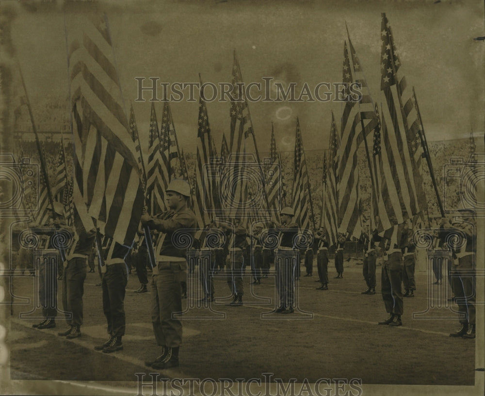 1967 Press Photo Sugar Bowl- Seabees display multiplicity of flags. - noa04136- Historic Images