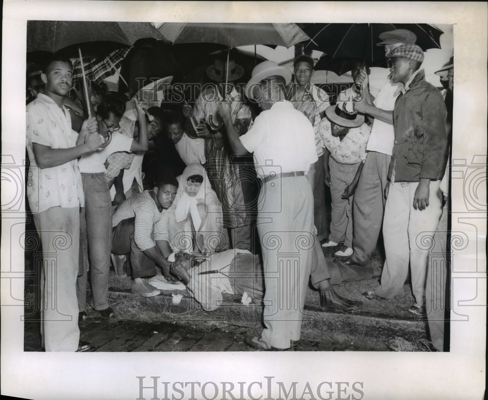 1956 Press Photo Hurricane Flossy- Injured victim of hurricane. - noa05133- Historic Images