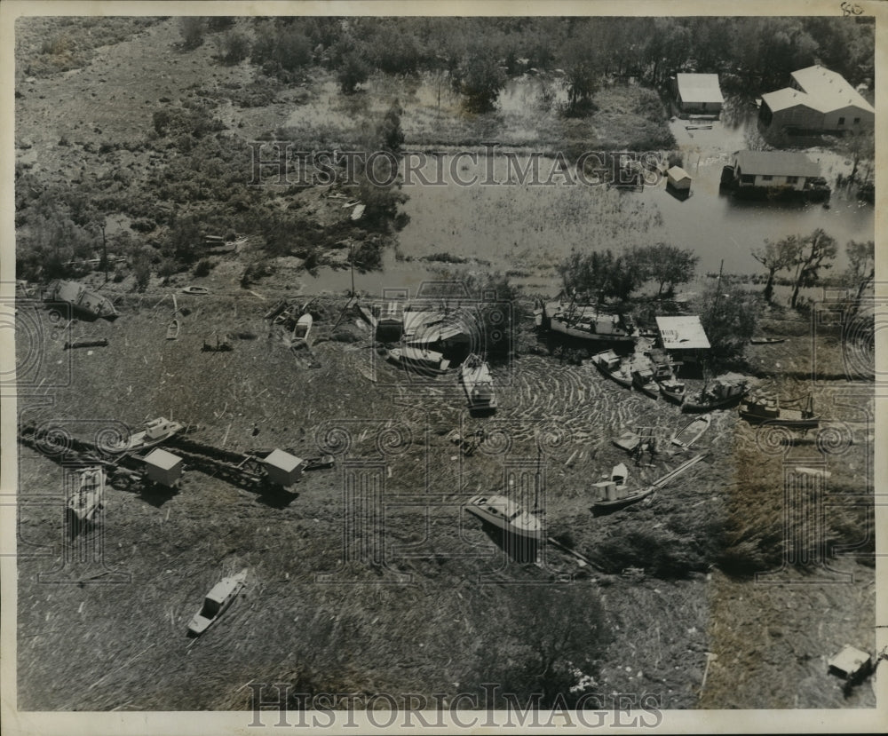 1956 Press Photo Hurricane Flossy-Scattered craft add to scene of destruction.- Historic Images