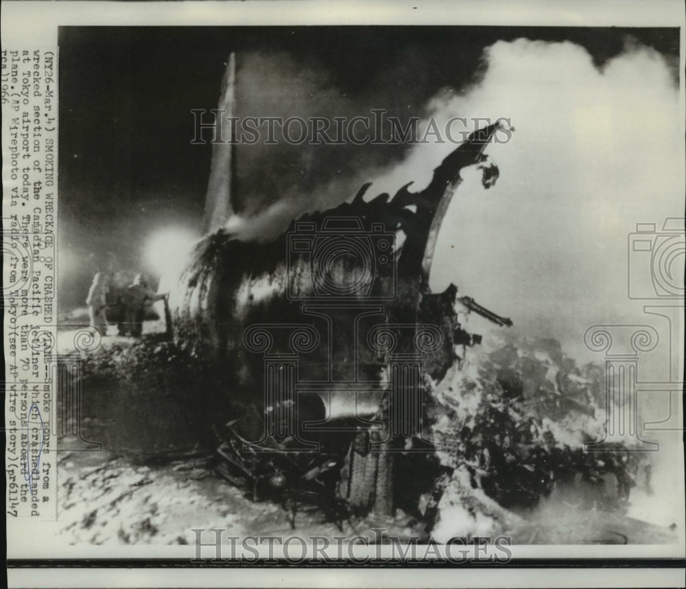 1966 Press Photo Smoke Pours From a Wrecked Section of the Canadian Pacific Jet- Historic Images