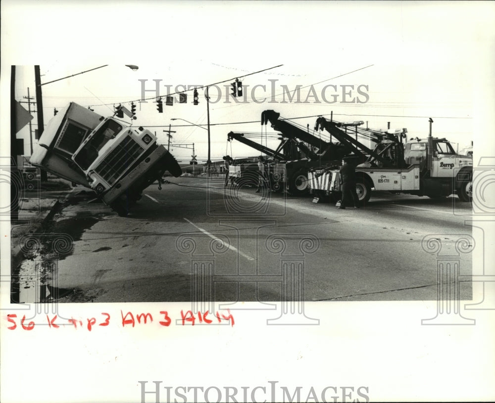 1984 Press Photo Accidents - An overturned truck on Airline Hwy. at David Drive.