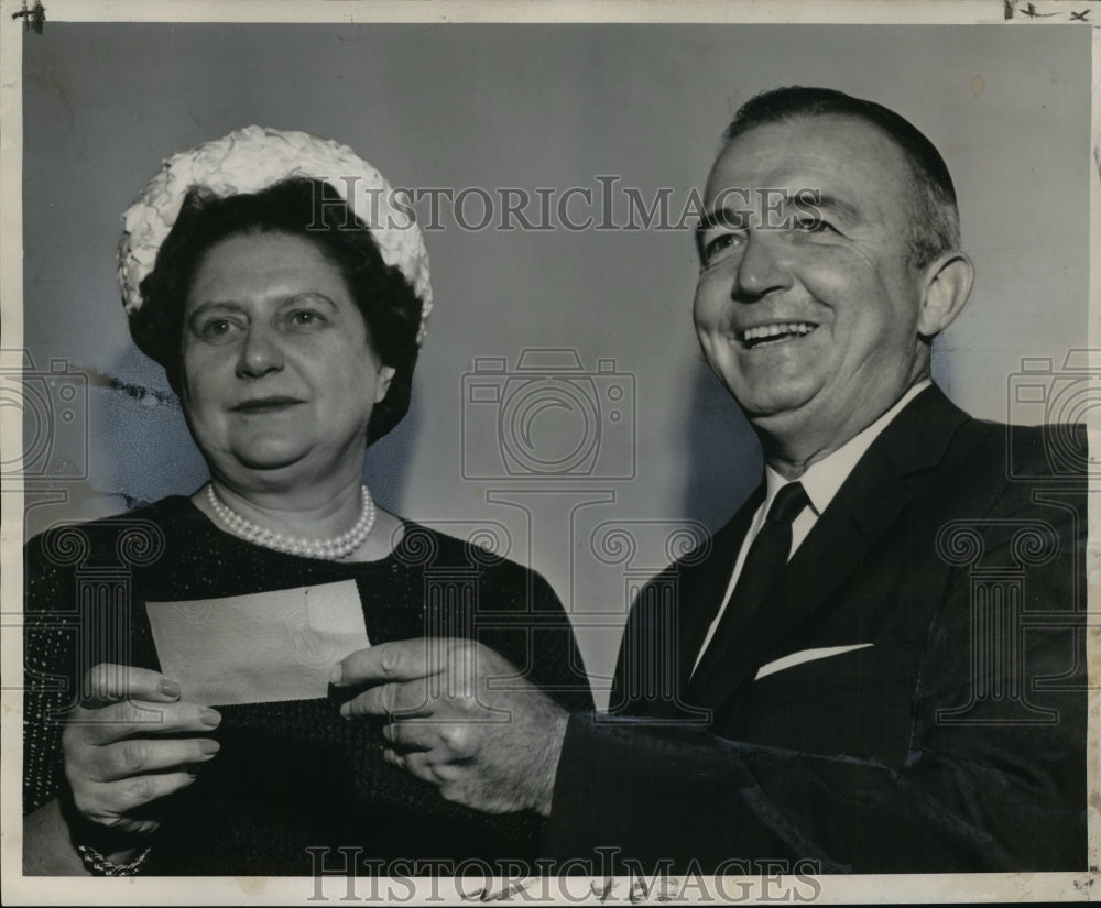 1961 Press Photo Goodwill Industries&#39; Allain Andry Jr. accepts auxillary check- Historic Images