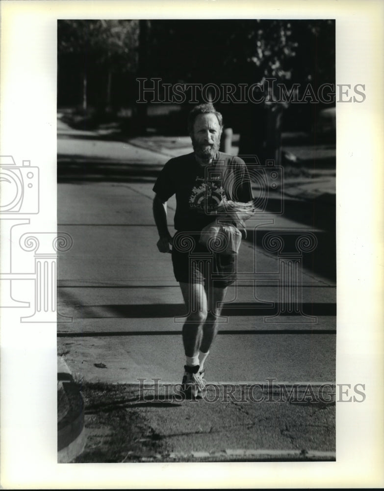 1991 Press Photo Basil Anex, Uno Professor Takes Morning Run - noa17191- Historic Images