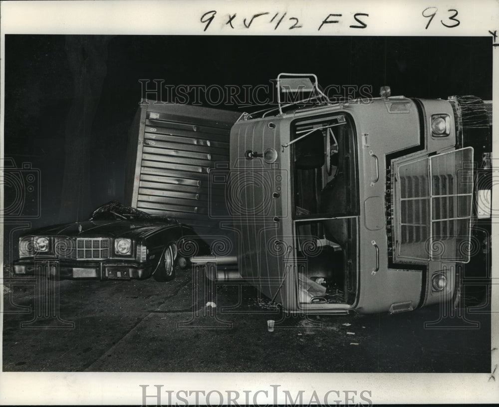  Press Photo Truck overturned on top of parked car, New Orleans- Historic Images