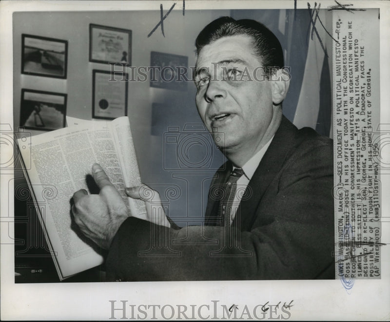 Load image into Gallery viewer, 1956 Press Photo Rep. Ross Bass with congressional record in his D.C. office
