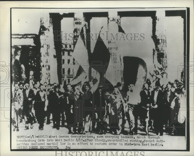 Load image into Gallery viewer, 1953 Press Photo Demonstrators march through Brandenburg Gate to West Berlin

