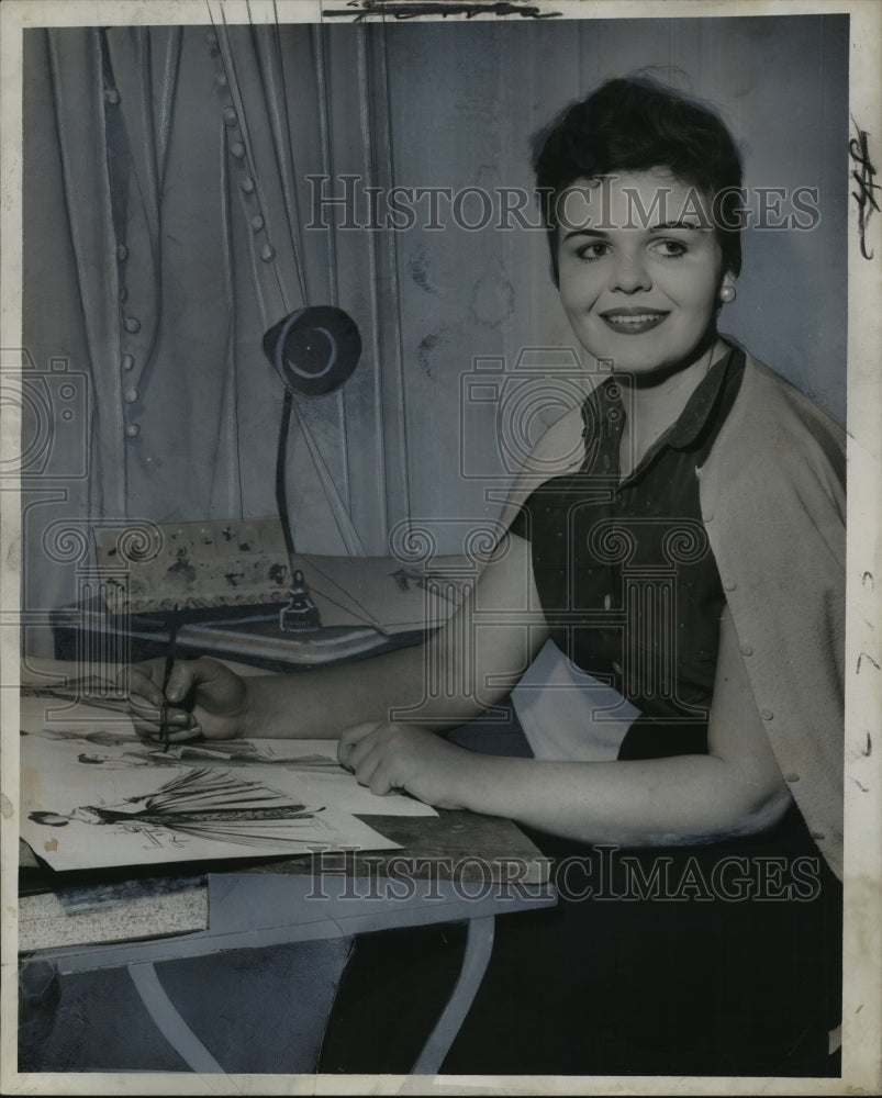 1957 Press Photo Barbara Faulkner designs her future dresses for operas