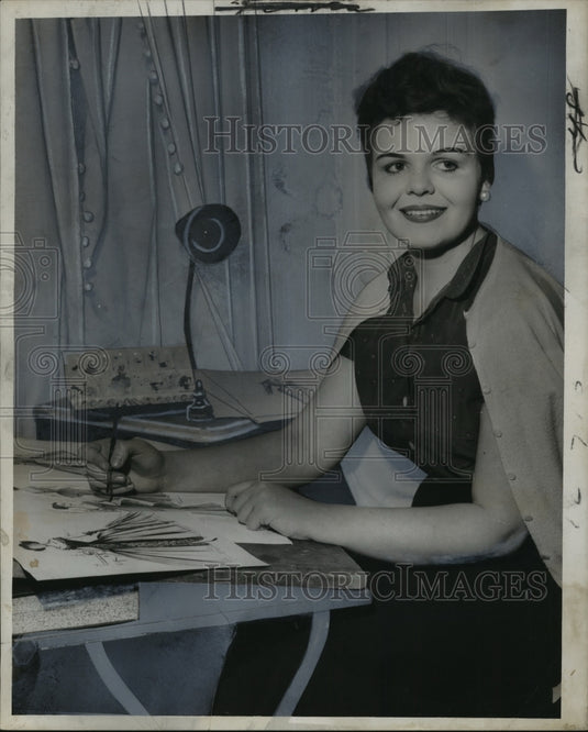 1957 Press Photo Barbara Faulkner designs her future dresses for operas
