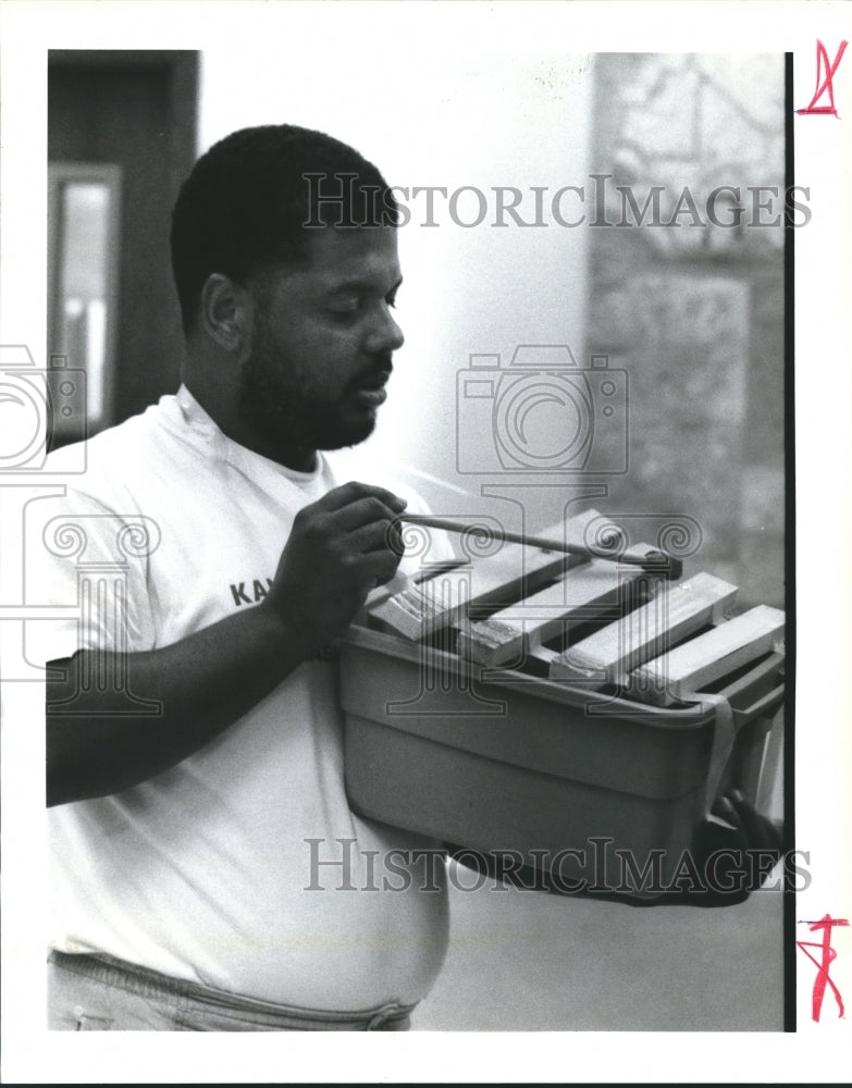 1992 Press Photo Jonathan Bloom tests his musical instrument in Music Class- Historic Images