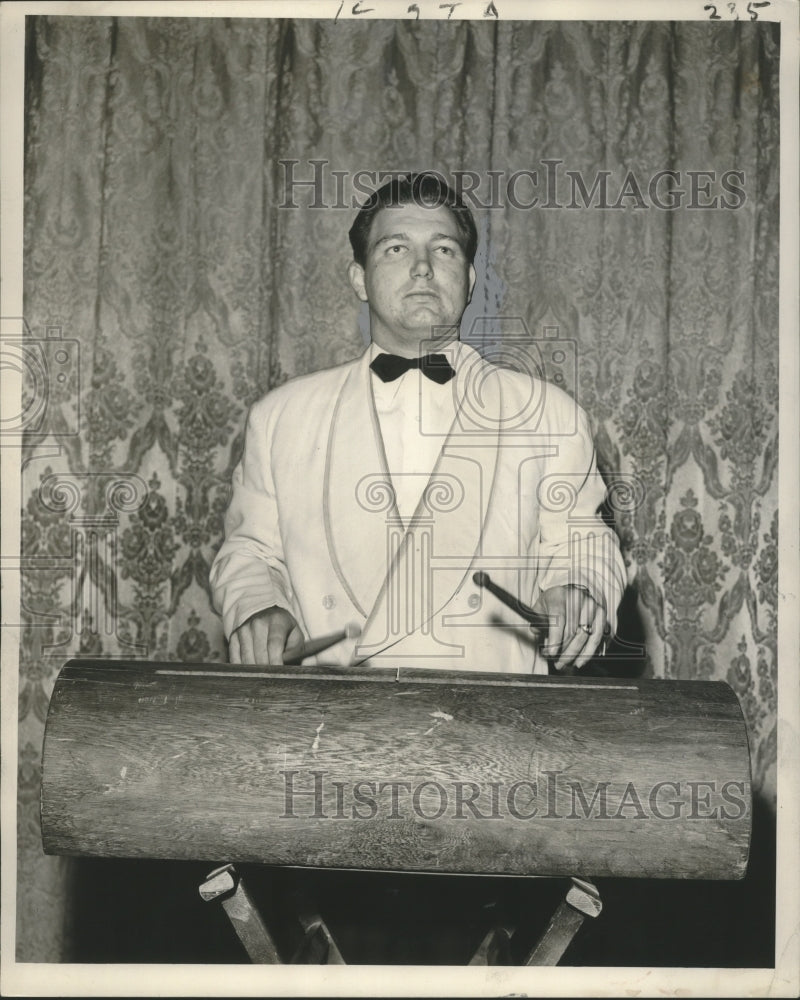 Load image into Gallery viewer, 1953 Press Photo Tulane University Concert Band Bass Drummer Harold Bretz plays
