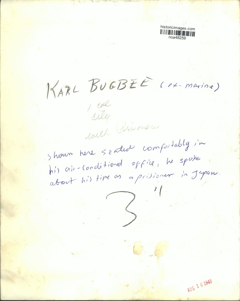 1946 Press Photo Ex-Marine and Japanese Prisoner, Karl Bugbee in his Office