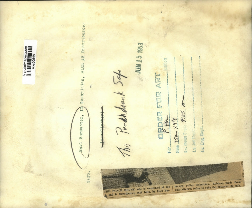 1953 Press Photo Police Technician Earl Burmaster at A and B Distributors