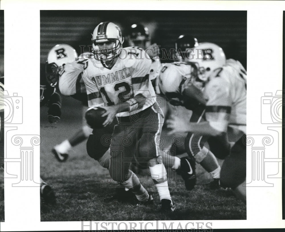 1992 Press Photo Brad Burckel, Rummel High School football, passes the ball off- Historic Images