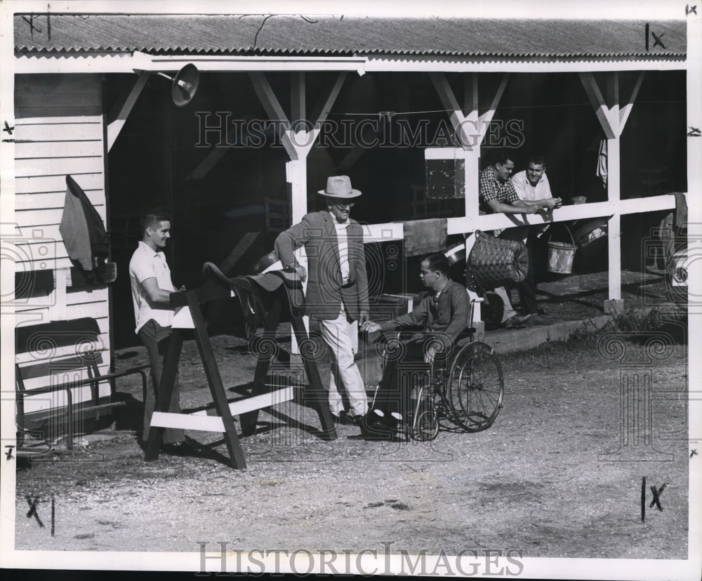 1961 Press Photo Herb Cavalier in Wheelchair at Horse Racing Stables with Others- Historic Images