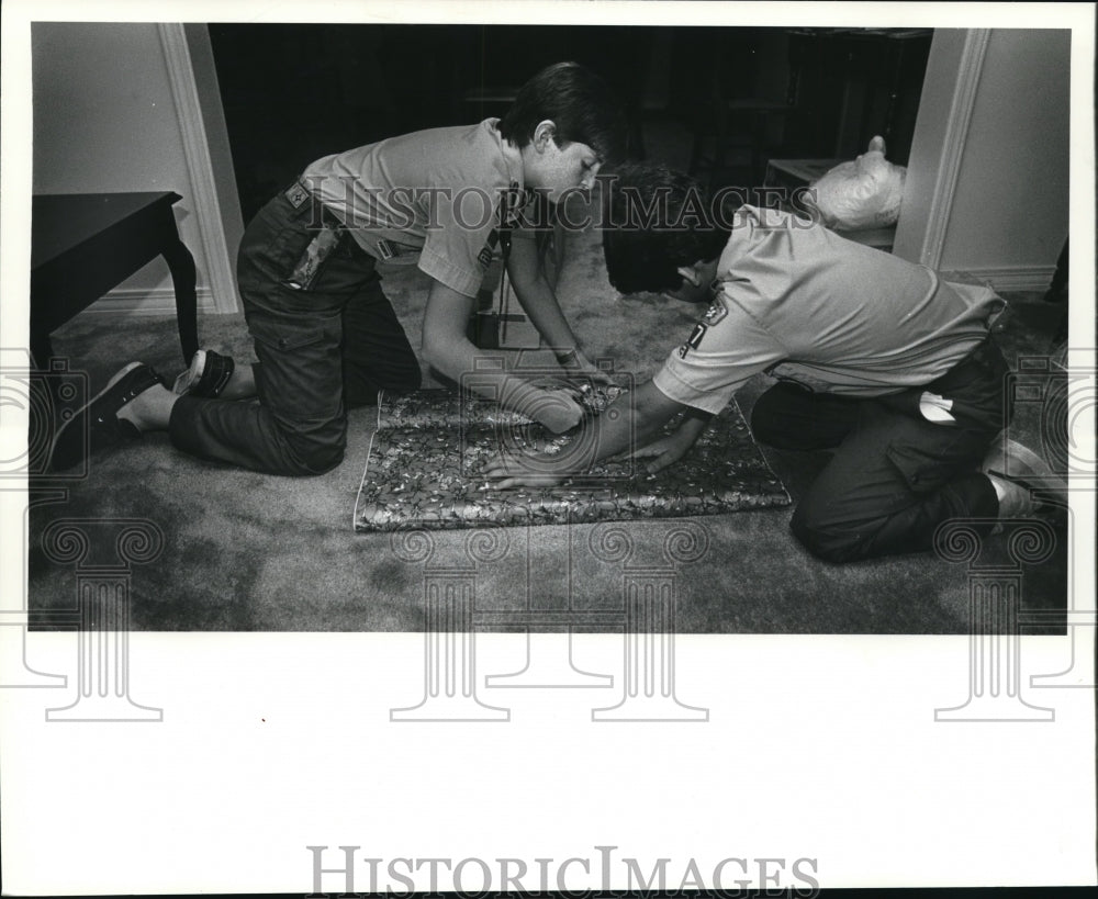  Press Photo Christmas - Boys Wrap Christmas Presents- Historic Images