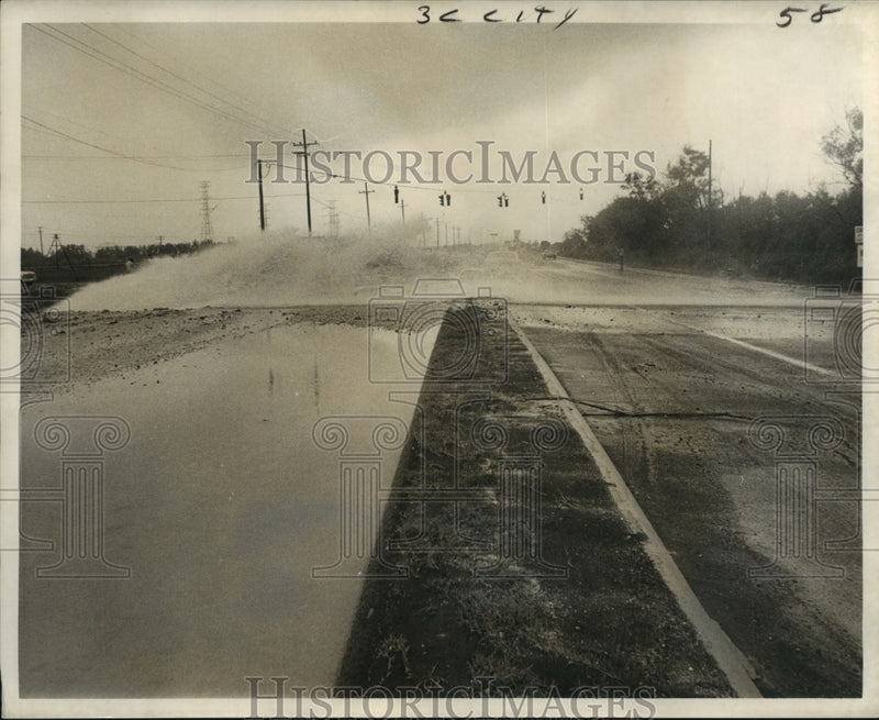 Load image into Gallery viewer, 1973 Press Photo Knocked over fire hydrant across Chef Menteur Highway
