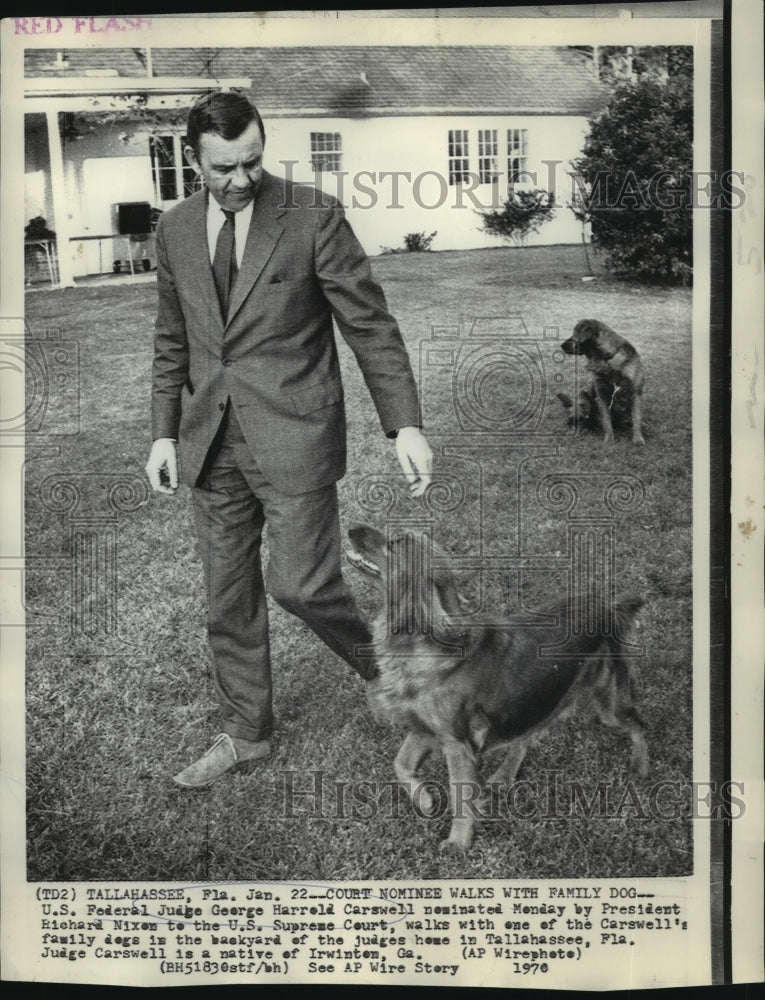 Load image into Gallery viewer, 1970 Press Photo Supreme Court nominee Judge George Harrold Carswell walks dog
