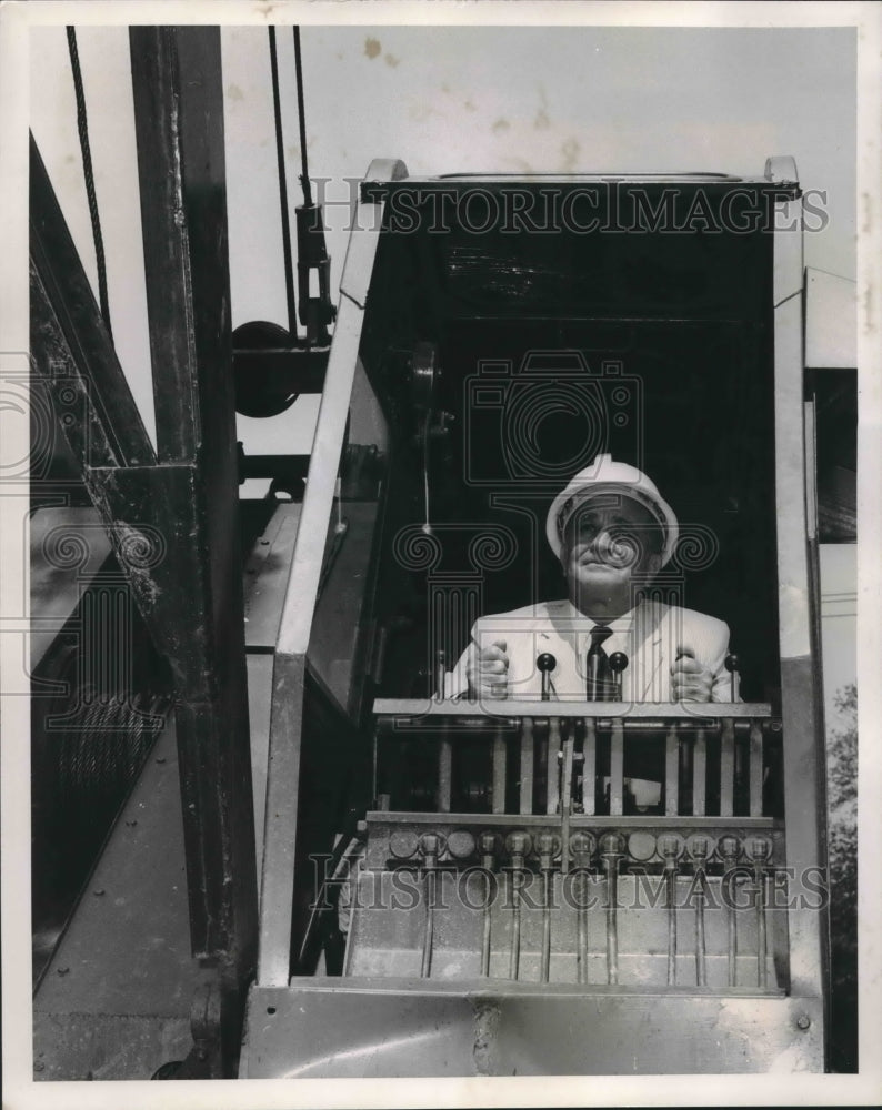 1969 Press Photo Chairman of the Board, James J. Coleman, operates equipment- Historic Images