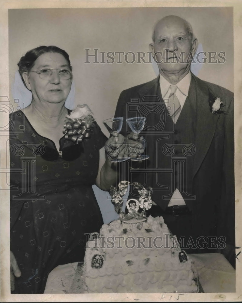 Load image into Gallery viewer, 1958 Press Photo Mr. &amp; Mrs. Dominick Chimento toast 50th wedding anniversary.
