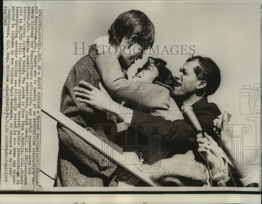 1965 Press Photo Tyrone Collins reunites with his mother & stepfather at airport