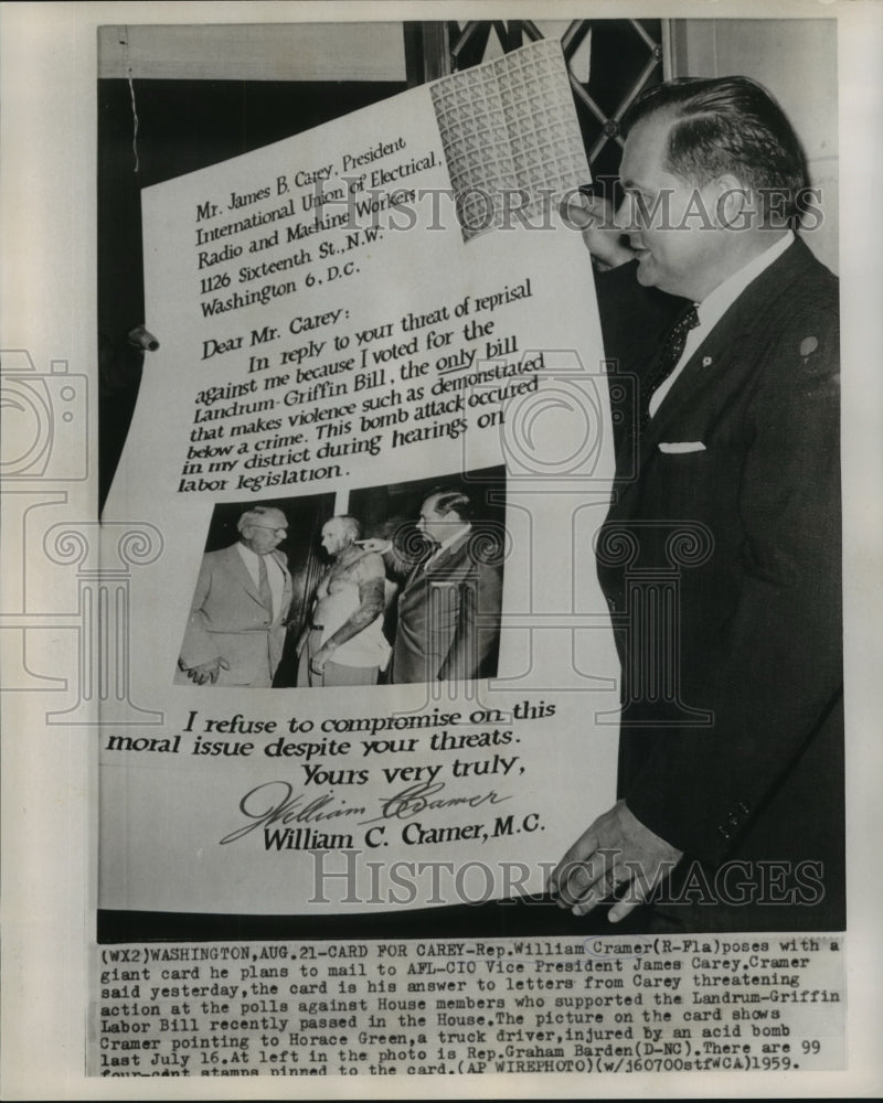 1959 Press Photo Rep. William Cramer poses with card he sent to Vice Pres Carey- Historic Images