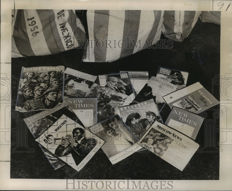 Load image into Gallery viewer, 1957 Press Photo Communists' propaganda materials in the port of New Orleans

