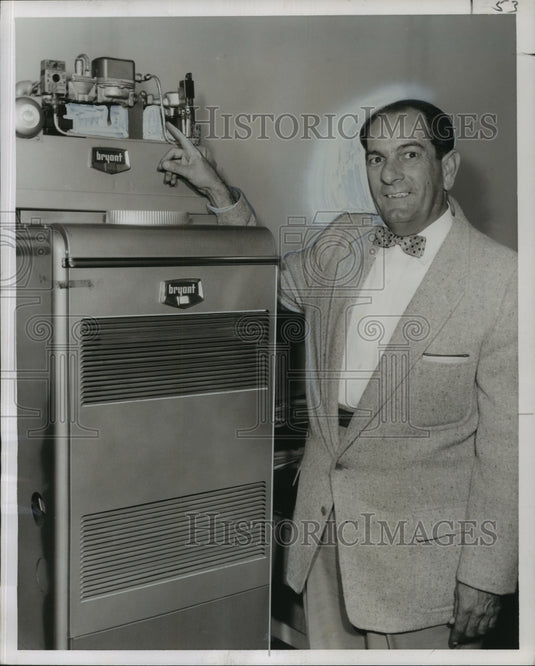 1957 Press Photo L. Charles Cressy, Bryant, Leaumont Company, shows new furnace