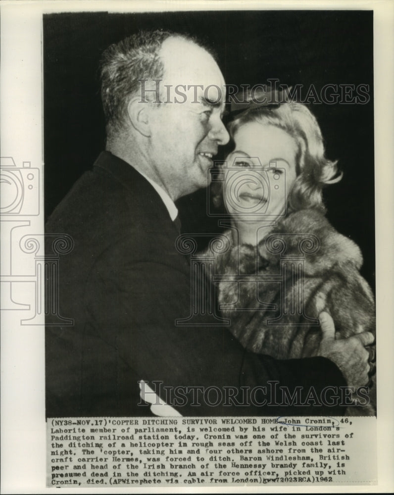 1962 Press Photo John Crenin, member of parliament, is welcomed home by his wife- Historic Images