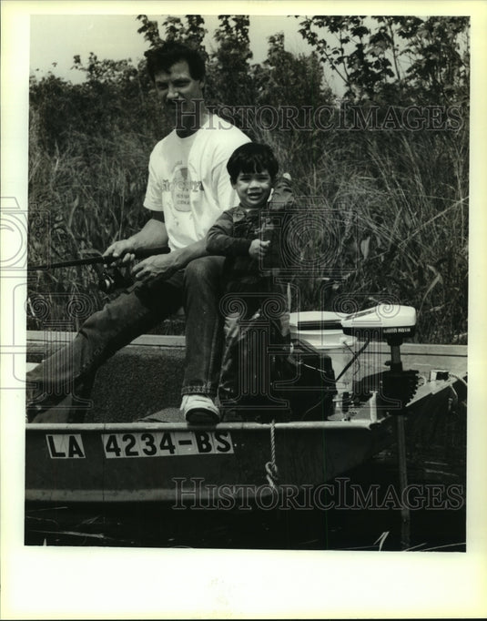 1991 Press Photo James Crippen, Jr. & James Crippen III fishing in Pearl River- Historic Images