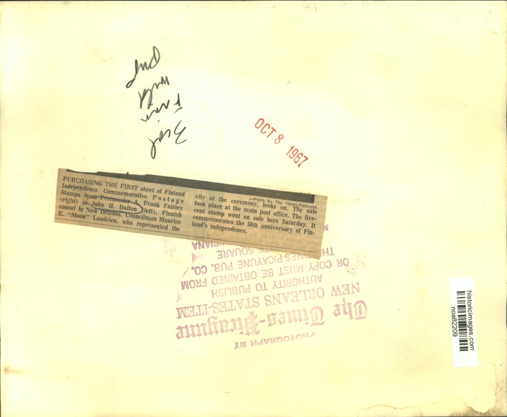 1967 Press Photo John H. Dalton, Finland, receives sheet of Finland stamps