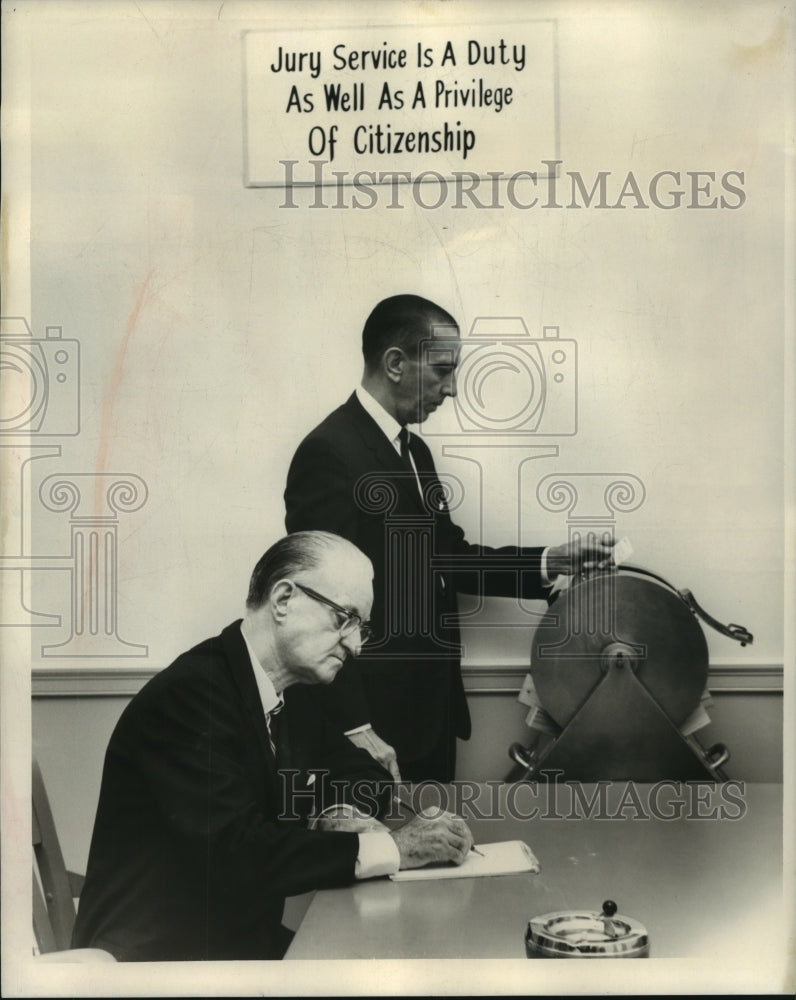 1967 Press Photo Orleans Parish Jury Commission chairman Noel J. Rada reads name- Historic Images