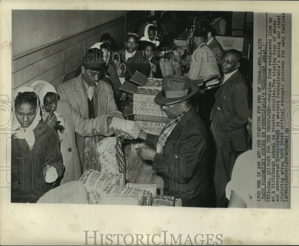 1961 Press Photo Surplus food recipients line up at a Pittsburgh school