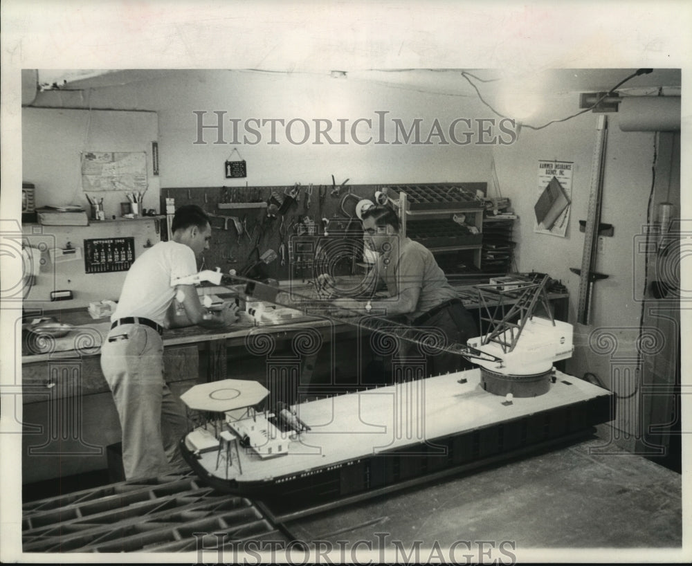 1966 Press Photo C.B. Diboll &amp; assistant working on a Model of oil derrick barge- Historic Images