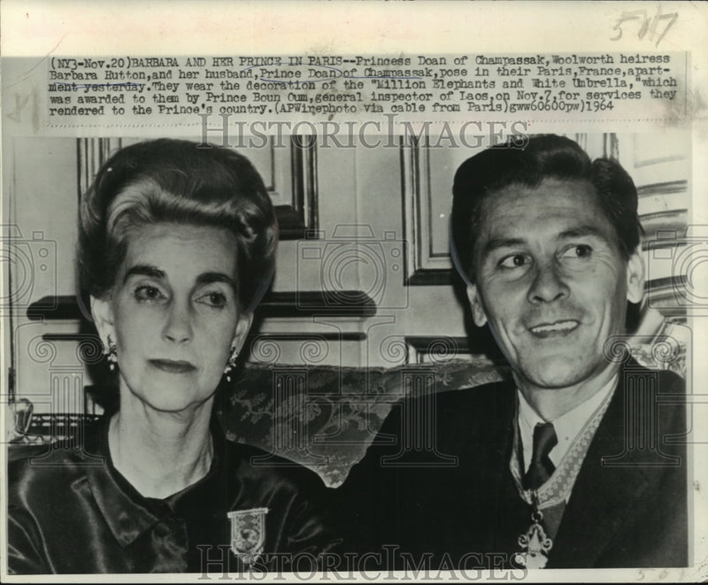 Load image into Gallery viewer, 1964 Press Photo Barbara Hutton and husband, Prince Doan of Champassak in Paris
