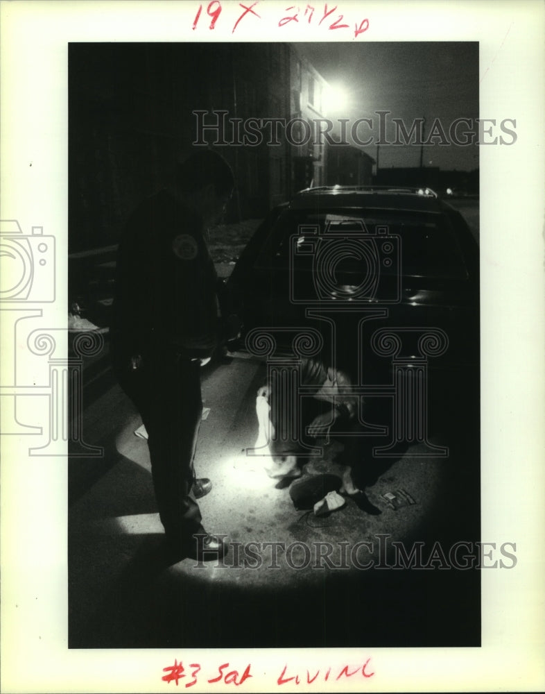 1993 Press Photo New Orleans Police Officer Major Checking a Suspect for Drugs- Historic Images