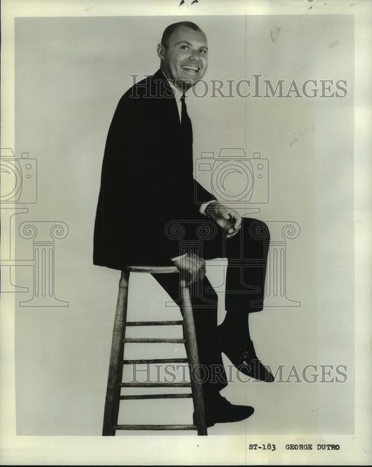 1965 Press Photo Hair fashion authority George Dutro at Antoine Salon, Godchaux