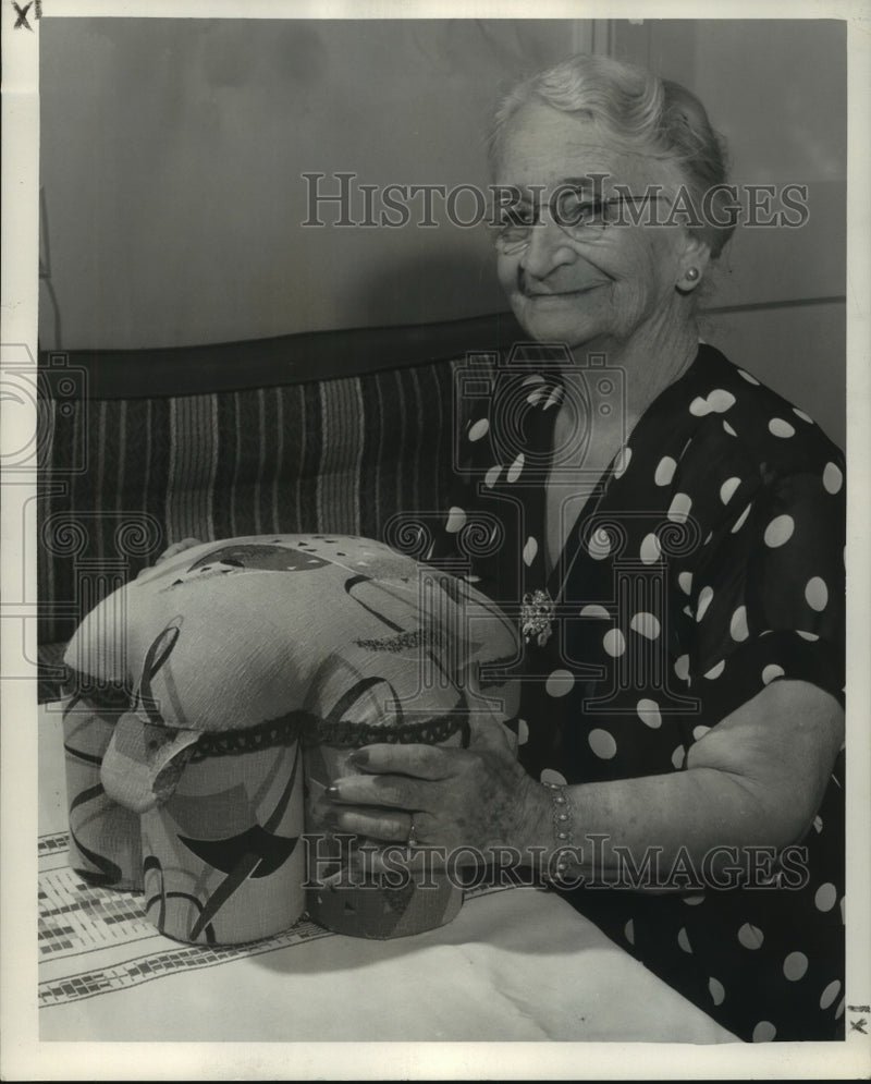 Load image into Gallery viewer, 1955 Press Photo Mrs. Mary Dupuis shows her finished footstool. - noa95596
