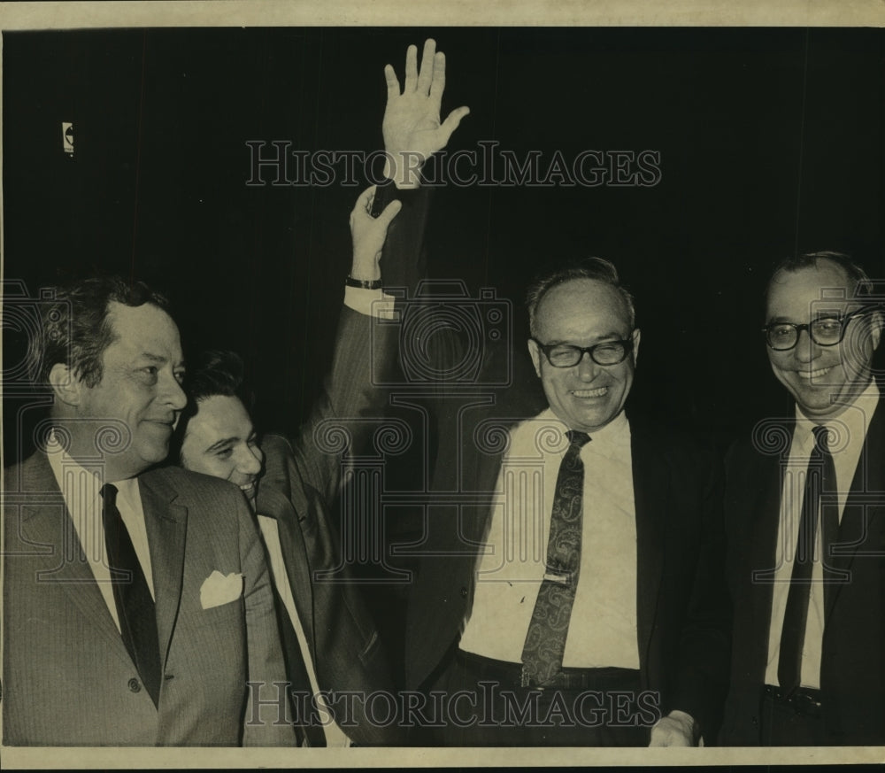 1969 Press Photo Chief defense attorney F. Irvin Dymond gives victory gesture