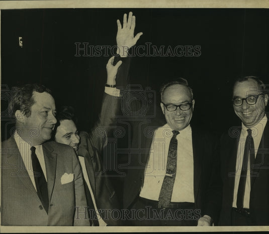 1969 Press Photo Chief defense attorney F. Irvin Dymond gives victory gesture